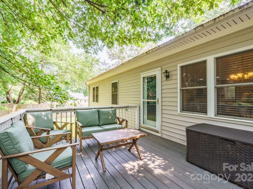 121 Jefferson Drive, Locust, NC 28097.  MLS# CAR4265160, YatesRealty ID 27760. Back deck, perfect for relaxing in the evening.