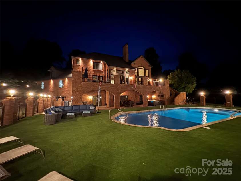 2770 Lakeview Drive, Lenoir, NC 28645.  MLS# CAR4274272, YatesRealty ID 27765. Back yard at night