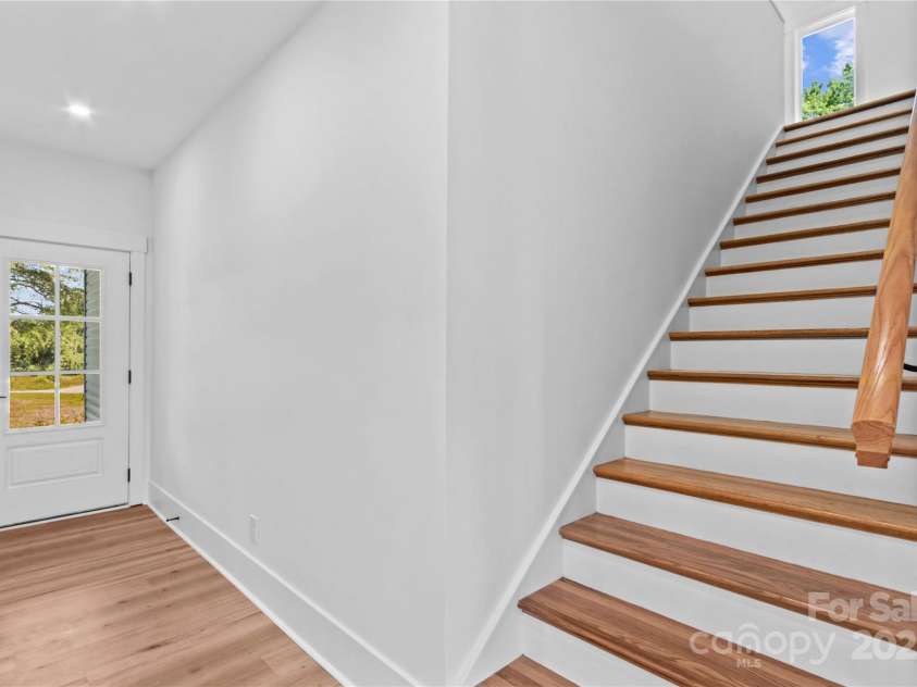 123 Ensign Place, Mooresville, NC 28117.  MLS# CAR4283762, YatesRealty ID 27768. Front Entry & Staircase