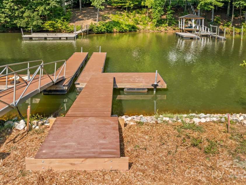 123 Ensign Place, Mooresville, NC 28117.  MLS# CAR4283762, YatesRealty ID 27768. Private Boat Pier (right)