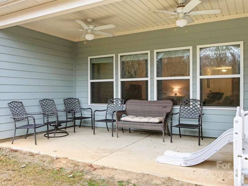 1328 Oakhurst Drive, Waxhaw, NC 28173.  MLS# CAR4332580, YatesRealty ID 2777. Covered Back Patio