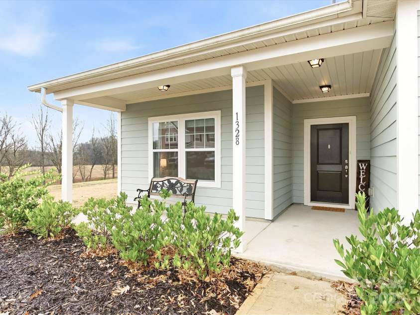 1328 Oakhurst Drive, Waxhaw, NC 28173.  MLS# CAR4332580, YatesRealty ID 2777. Large Covered Front Porch