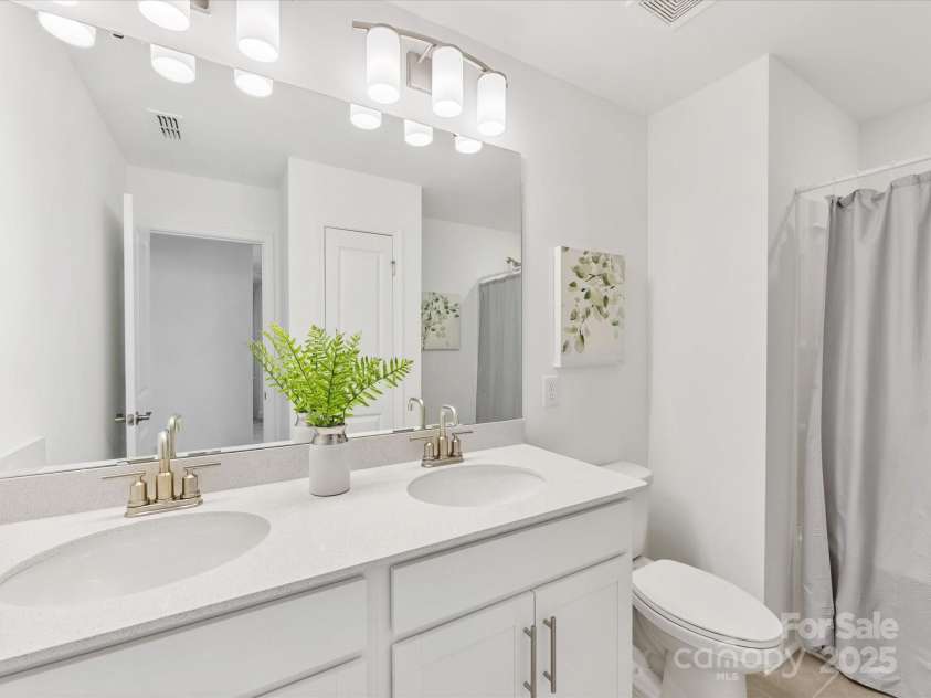 1516 Respect Street, Concord, NC 28027.  MLS# CAR4274027, YatesRealty ID 27774. Guest Bathroom