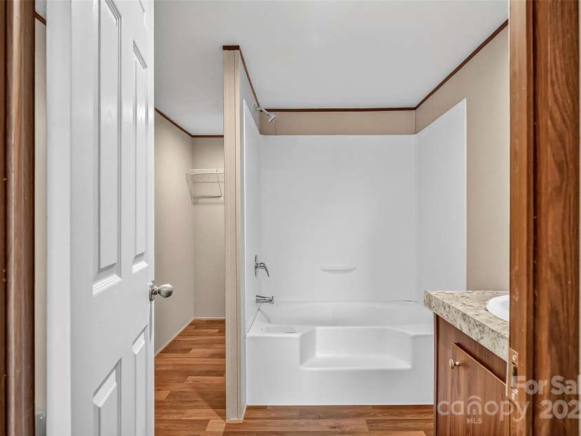 136 Weiss Road, Asheville, NC 28806.  MLS# CAR4283338, YatesRealty ID 27779. Primary Bathroom with huge walk-in closet