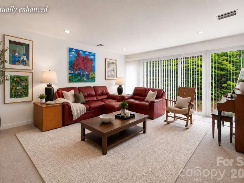 515 Poplar Street, Charlotte, NC 28202.  MLS# CAR4378649, YatesRealty ID 27783. Versatile entertainment level perfect for game nights, media viewing, or lounge space (virtually enhanced)