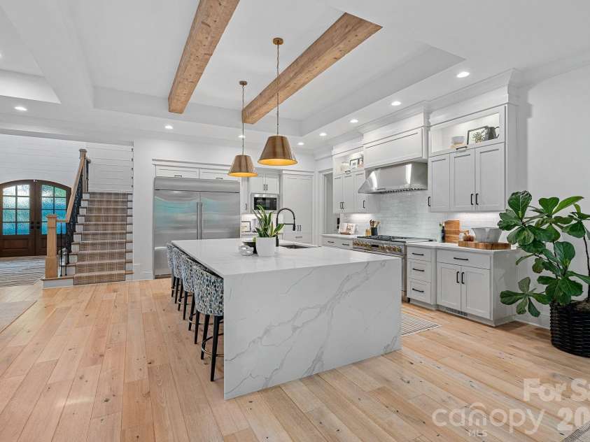 17416 Gillican Overlook Road, Davidson, NC 28036.  MLS# CAR4373444, YatesRealty ID 27790. Hidden walk-in pantry with full size second fridge