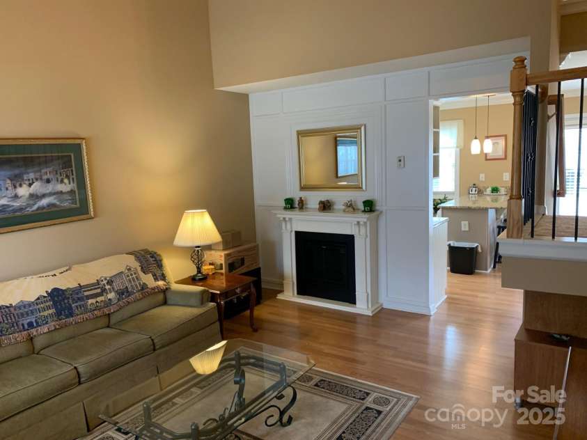 147 Limerick Road, Mooresville, NC 28115.  MLS# CAR4278927, YatesRealty ID 27814. LIVING WITH FIREPLACE AND CATHEDRAL CEILING