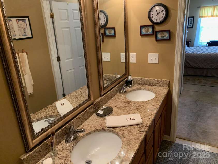 147 Limerick Road, Mooresville, NC 28115.  MLS# CAR4278927, YatesRealty ID 27814. SOLID SURFACE COUNTER AND DOUBLE VANITY