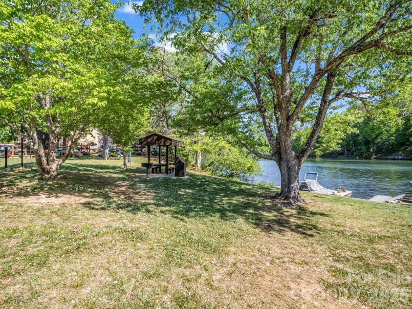 182 Lake Drive, Lake Lure, NC 28746.  MLS# CAR4372421, YatesRealty ID 27814. Bald Mtn Lake