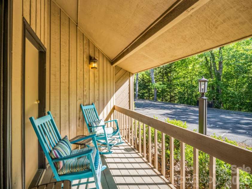 182 Lake Drive, Lake Lure, NC 28746.  MLS# CAR4372421, YatesRealty ID 27814. Front Porch Entry