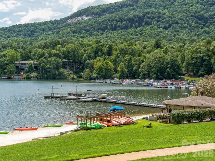 182 Lake Drive, Lake Lure, NC 28746.  MLS# CAR4372421, YatesRealty ID 27814. Private Beach