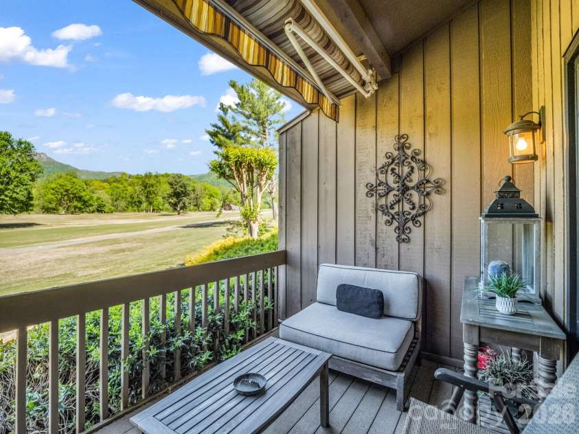 182 Lake Drive, Lake Lure, NC 28746.  MLS# CAR4372421, YatesRealty ID 27814. Stunning Mountain & Fairway Views