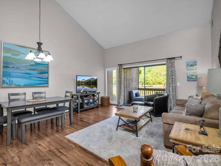 182 Lake Drive, Lake Lure, NC 28746.  MLS# CAR4372421, YatesRealty ID 27814. Vaulted Ceiling Living Room