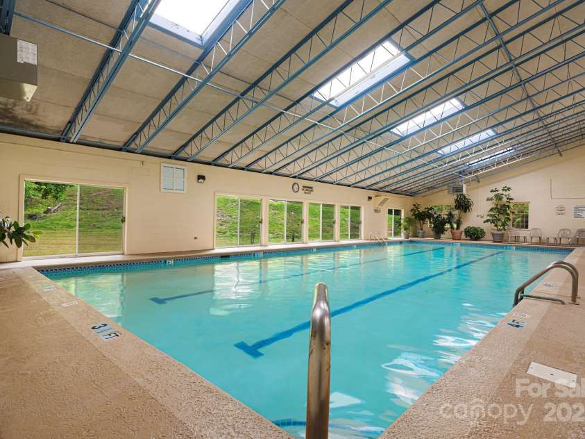 609 Carriage Commons Drive, Hendersonville, NC 28791.  MLS# CAR4271397, YatesRealty ID 27819. 