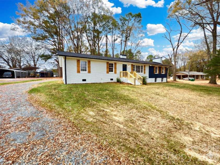 221 Pecan Drive, Oakboro, NC 28129.  MLS# CAR4325429, YatesRealty ID 2782. Sky Virtually Stage