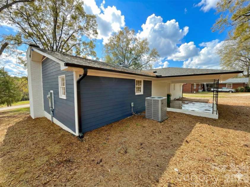 221 Pecan Drive, Oakboro, NC 28129.  MLS# CAR4325429, YatesRealty ID 2782. Sky Virtually Stage