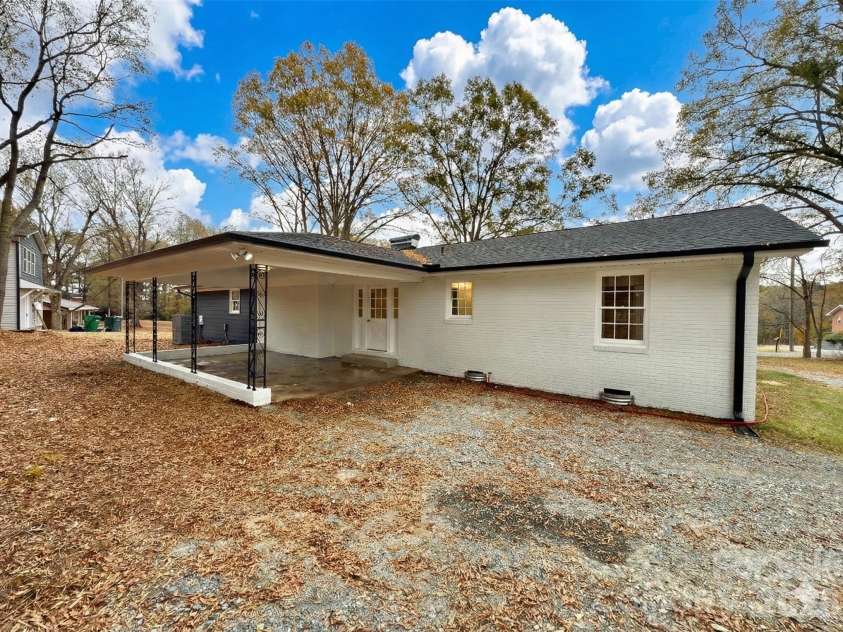 221 Pecan Drive, Oakboro, NC 28129.  MLS# CAR4325429, YatesRealty ID 2782. Sky Virtually Stage