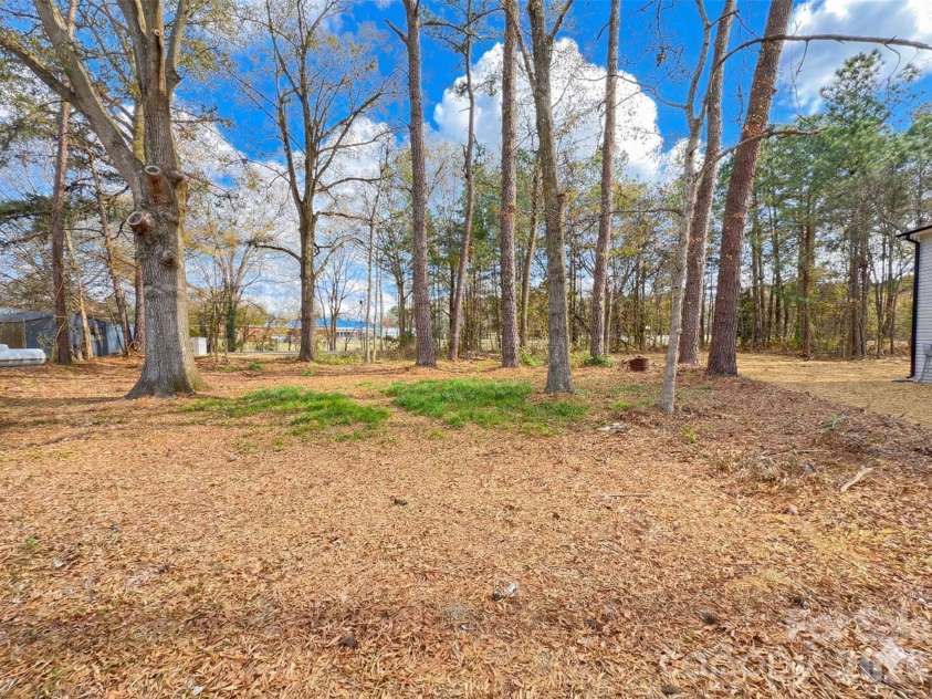 221 Pecan Drive, Oakboro, NC 28129.  MLS# CAR4325429, YatesRealty ID 2782. Sky Virtually Stage