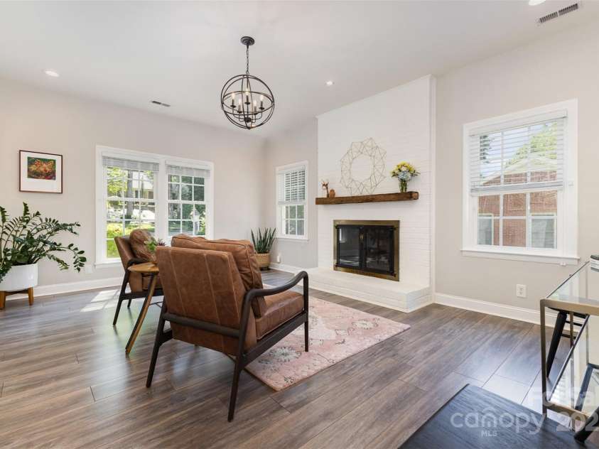 526 Trail Ridge Road, Matthews, NC 28105.  MLS# CAR4279013, YatesRealty ID 27824. Living room w/gas logs fireplace