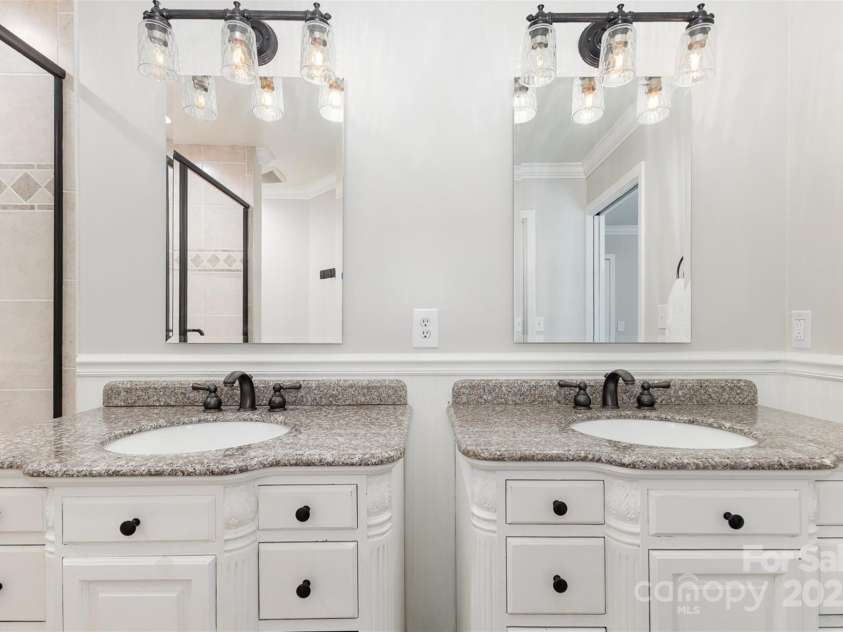 526 Trail Ridge Road, Matthews, NC 28105.  MLS# CAR4279013, YatesRealty ID 27824. Primary bath dual vanities