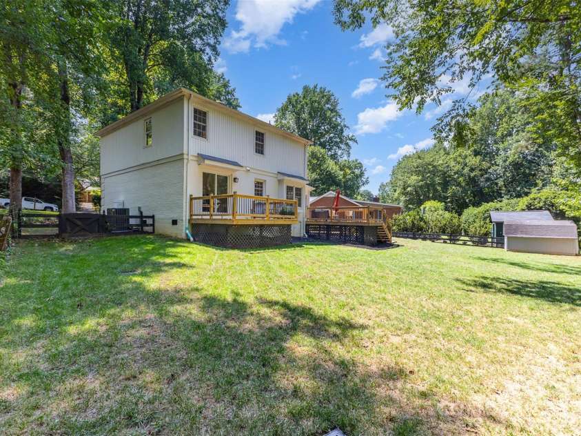526 Trail Ridge Road, Matthews, NC 28105.  MLS# CAR4279013, YatesRealty ID 27824. Rear view w/shed