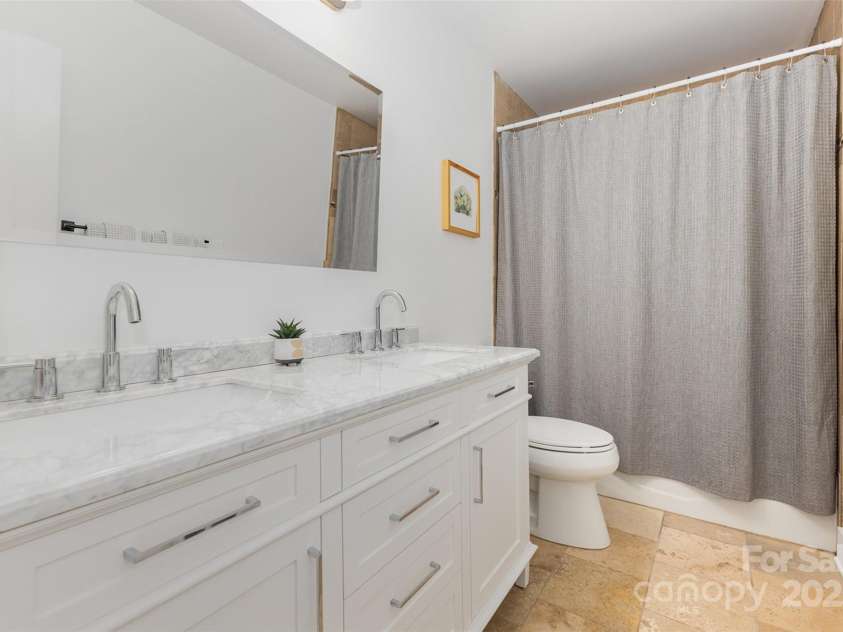 526 Trail Ridge Road, Matthews, NC 28105.  MLS# CAR4279013, YatesRealty ID 27824. Second bathroom - marble vanity w/dual sinks