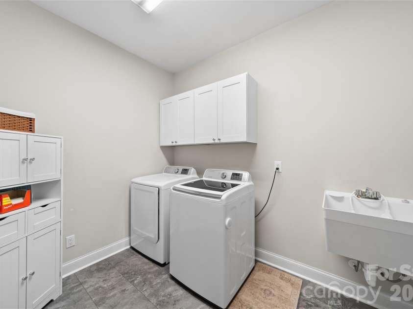 1055 Coppergate Drive, Salisbury, NC 28147.  MLS# CAR4350263, YatesRealty ID 27825. Expansive laundry room with sink