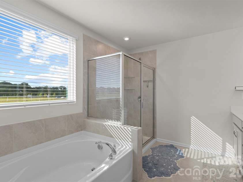 2333 Lorelei Terrace, Monroe, NC 28112.  MLS# CAR4419697, YatesRealty ID 27827. Primary bathroom