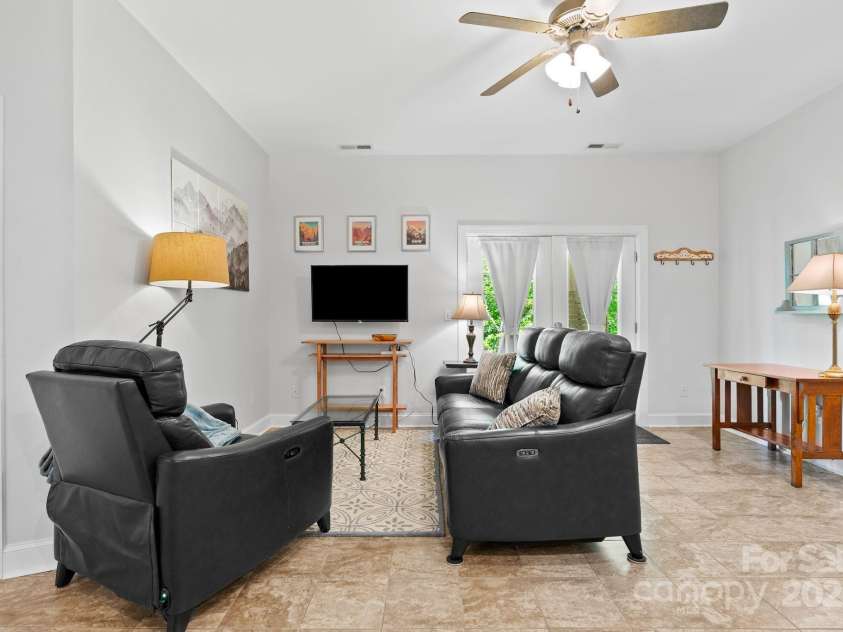 50 Pinerose Drive, Weaverville, NC 28787.  MLS# CAR4255853, YatesRealty ID 27829. Daylight Basement