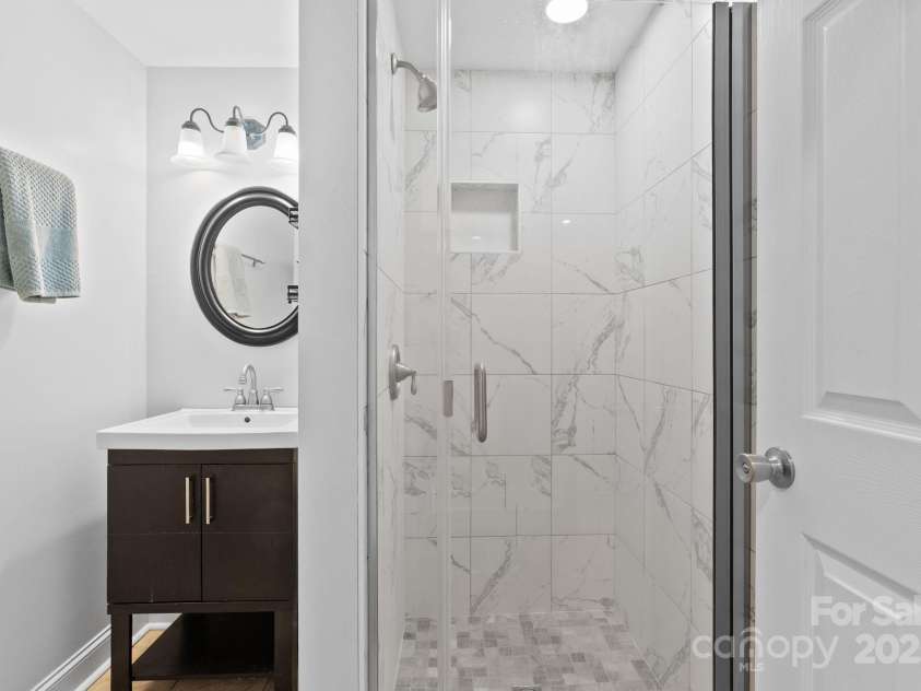 50 Pinerose Drive, Weaverville, NC 28787.  MLS# CAR4255853, YatesRealty ID 27829. Full Bathroom in Daylight Basement