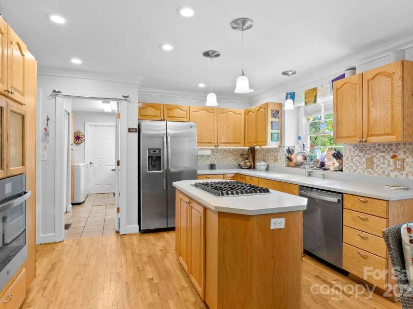 50 Pinerose Drive, Weaverville, NC 28787.  MLS# CAR4255853, YatesRealty ID 27829. Kitchen with Gas Range