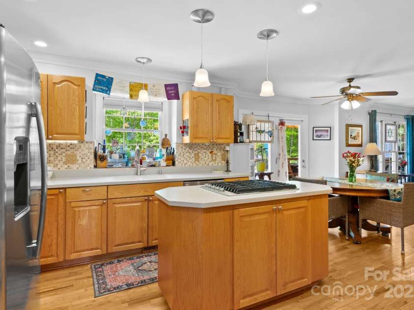 50 Pinerose Drive, Weaverville, NC 28787.  MLS# CAR4255853, YatesRealty ID 27829. Kitchen with Gas Range