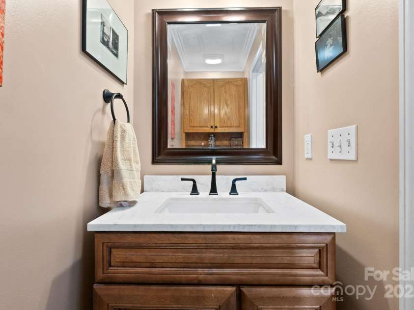 50 Pinerose Drive, Weaverville, NC 28787.  MLS# CAR4255853, YatesRealty ID 27829. Main Level Half Bath