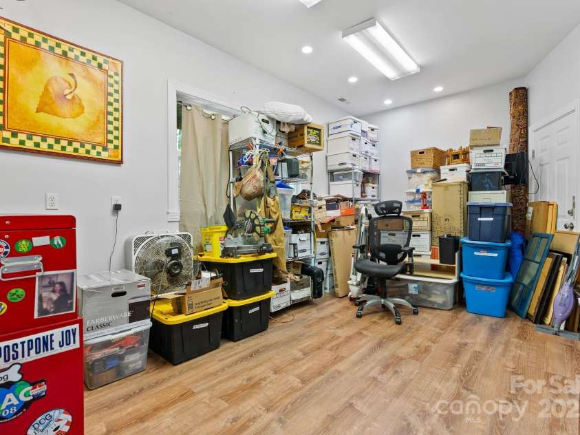 50 Pinerose Drive, Weaverville, NC 28787.  MLS# CAR4255853, YatesRealty ID 27829. Storage Room in Daylight Basement
