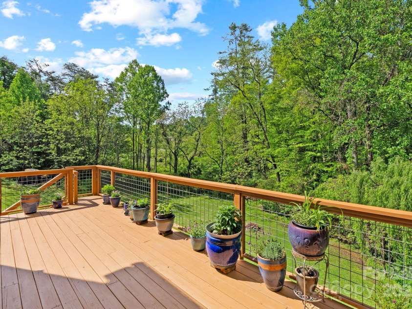 50 Pinerose Drive, Weaverville, NC 28787.  MLS# CAR4255853, YatesRealty ID 27829. Sunny Back Deck