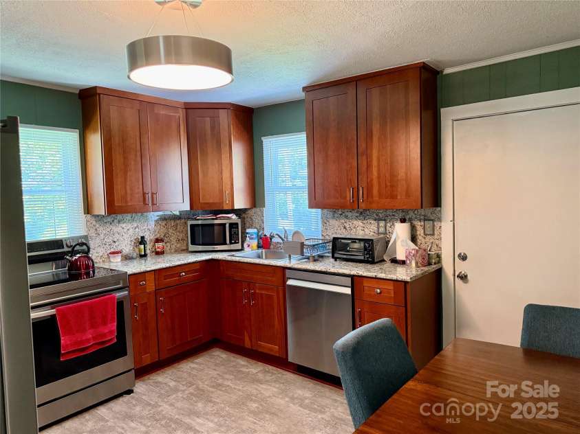 703 Stage Street, Lenoir, NC 28645.  MLS# CAR4278258, YatesRealty ID 27841. 