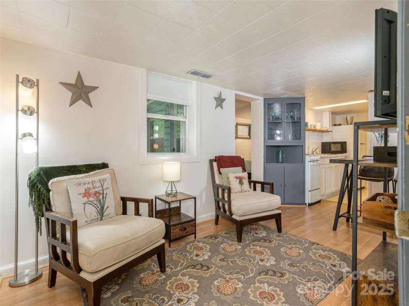 61 Lake View Road, Hendersonville, NC 28739.  MLS# CAR4255428, YatesRealty ID 27846. Apartment Sitting Area