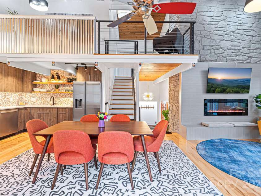 1585 Eagles Nest Road, Waynesville, NC 28786.  MLS# CAR4171726, YatesRealty ID 27848. Dining room and kitchen