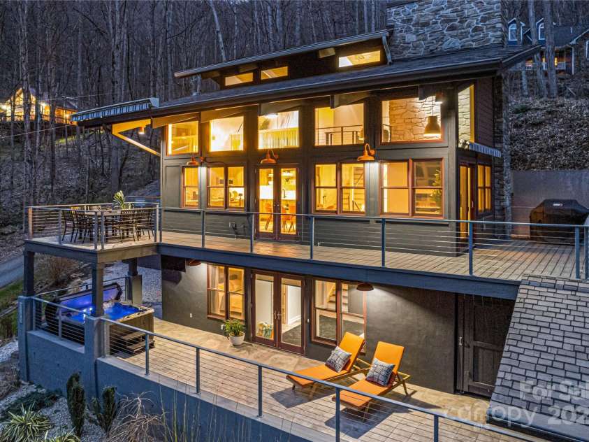 1585 Eagles Nest Road, Waynesville, NC 28786.  MLS# CAR4171726, YatesRealty ID 27848. Exterior at night