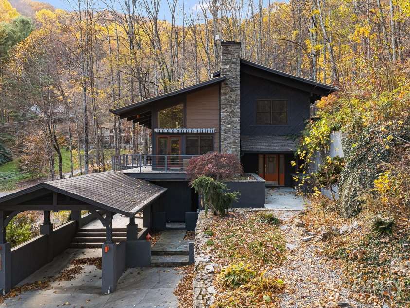 1585 Eagles Nest Road, Waynesville, NC 28786.  MLS# CAR4171726, YatesRealty ID 27848. Exterior from side