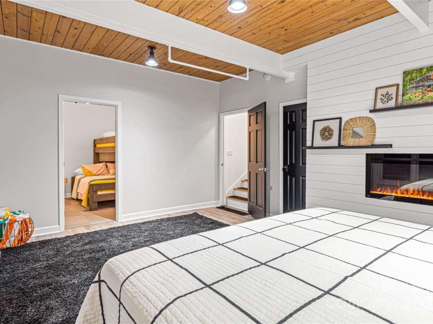 1585 Eagles Nest Road, Waynesville, NC 28786.  MLS# CAR4171726, YatesRealty ID 27848. Primary Bedroom