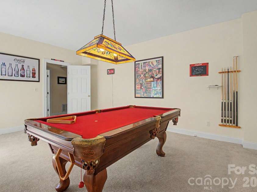 606 Carriage Commons Drive, Hendersonville, NC 28791.  MLS# CAR4386176, YatesRealty ID 27849. Billiard/Game Room