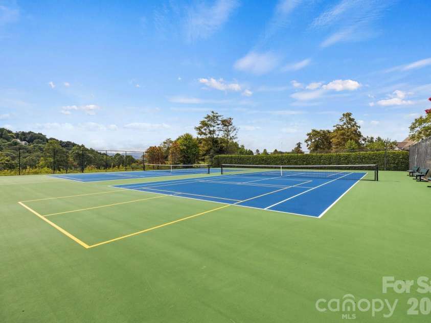 606 Carriage Commons Drive, Hendersonville, NC 28791.  MLS# CAR4386176, YatesRealty ID 27849. Tennis Courts