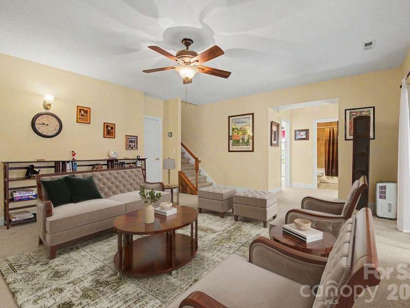 606 Carriage Commons Drive, Hendersonville, NC 28791.  MLS# CAR4386176, YatesRealty ID 27849. Virtually Staged
