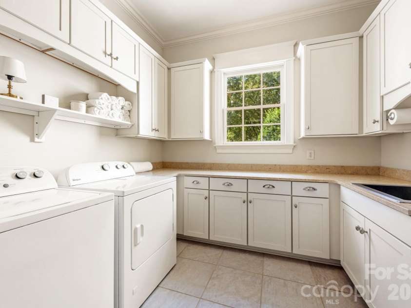 946 Laurel Creek Lane, Charlotte, NC 28211.  MLS# CAR4298519, YatesRealty ID 2785. Laundry Room