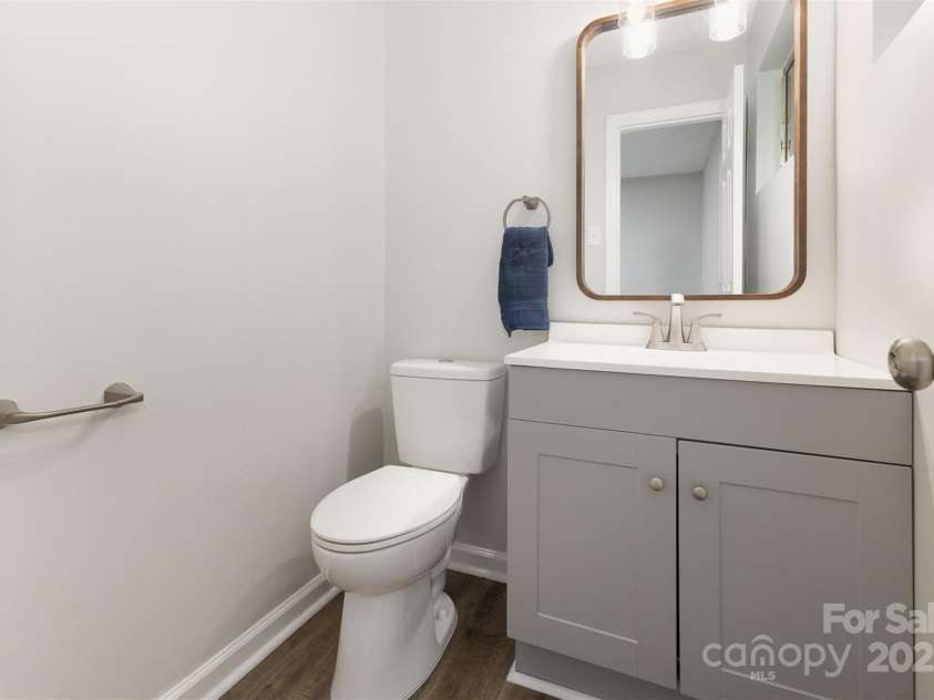 1948 Marett Boulevard, Rock Hill, SC 29732.  MLS# CAR4279829, YatesRealty ID 27851. Primary Bedroom Half Bath