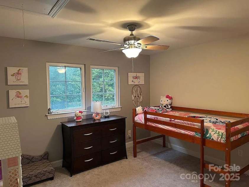 219 Flowering Grove Lane, Mooresville, NC 28115.  MLS# CAR4275731, YatesRealty ID 27853. Bed#2 nice size bedroom/ceiling fan 