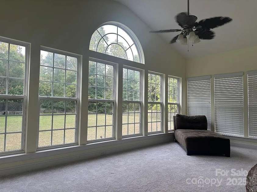 219 Flowering Grove Lane, Mooresville, NC 28115.  MLS# CAR4275731, YatesRealty ID 27853. Spacious Sunroom w/ lots of natural light 