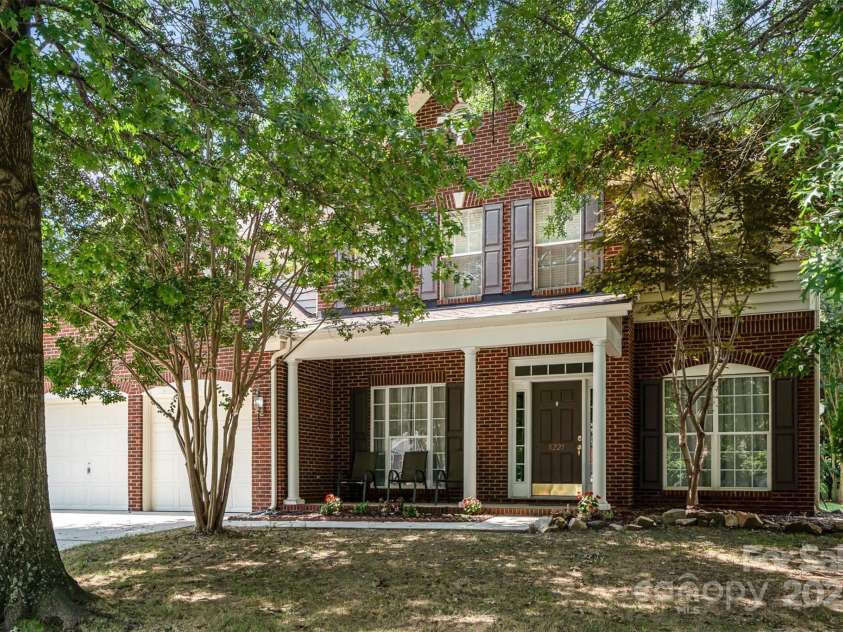 8221 Brookings Drive, Charlotte, NC 28269.  MLS# CAR4257693, YatesRealty ID 27860. Huge porch!