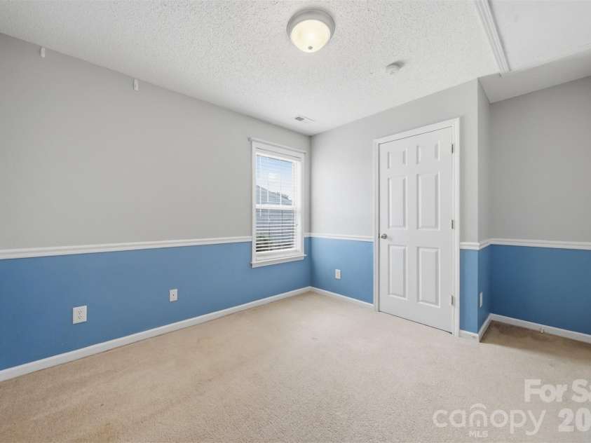 2155 Edenderry Drive, Statesville, NC 28625.  MLS# CAR4388561, YatesRealty ID 27864. Bedroom #2 has a nice sized closet.